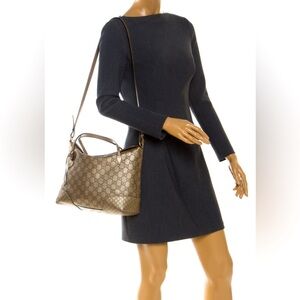 Gucci
Bree Convertible Top Handle Bag Guccissima Leather Medium. In gold tone❣️